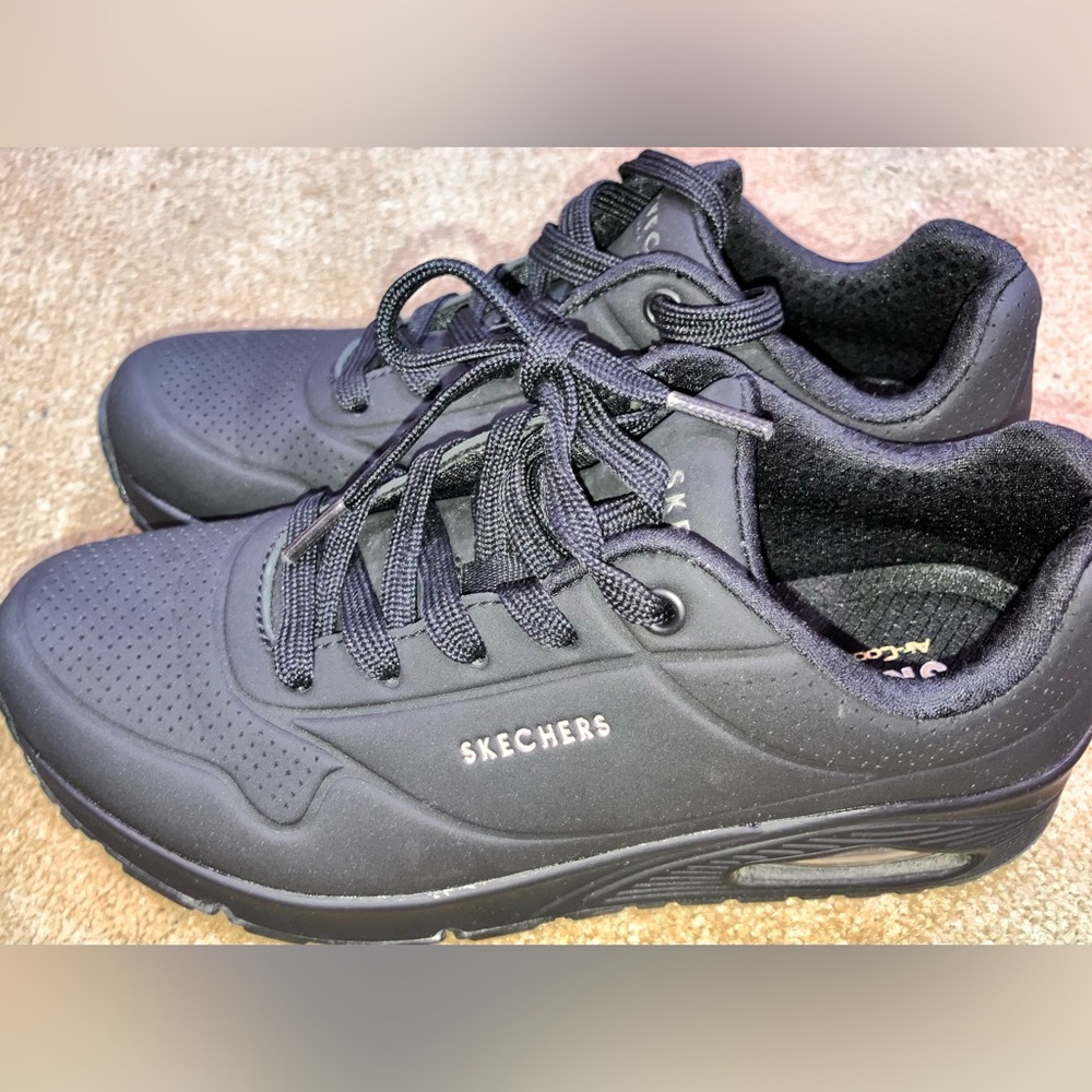 Skechers Street tennis shoes.